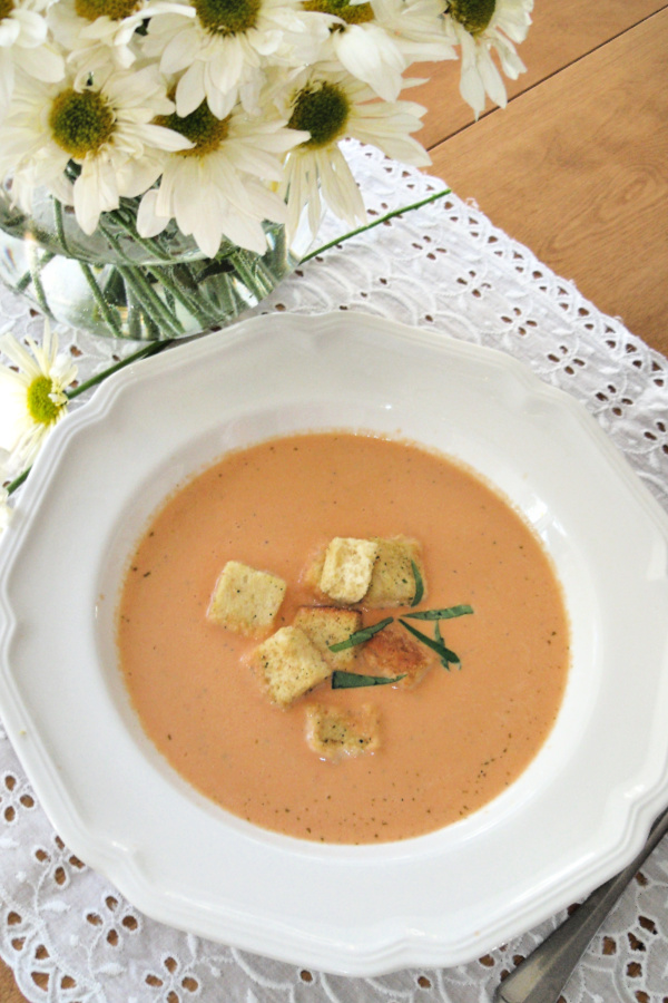 A delicious and easy recipe for fresh tomato bisque. Rome tomatoes and basil with cream and croutons make for a bright and tasty soup.