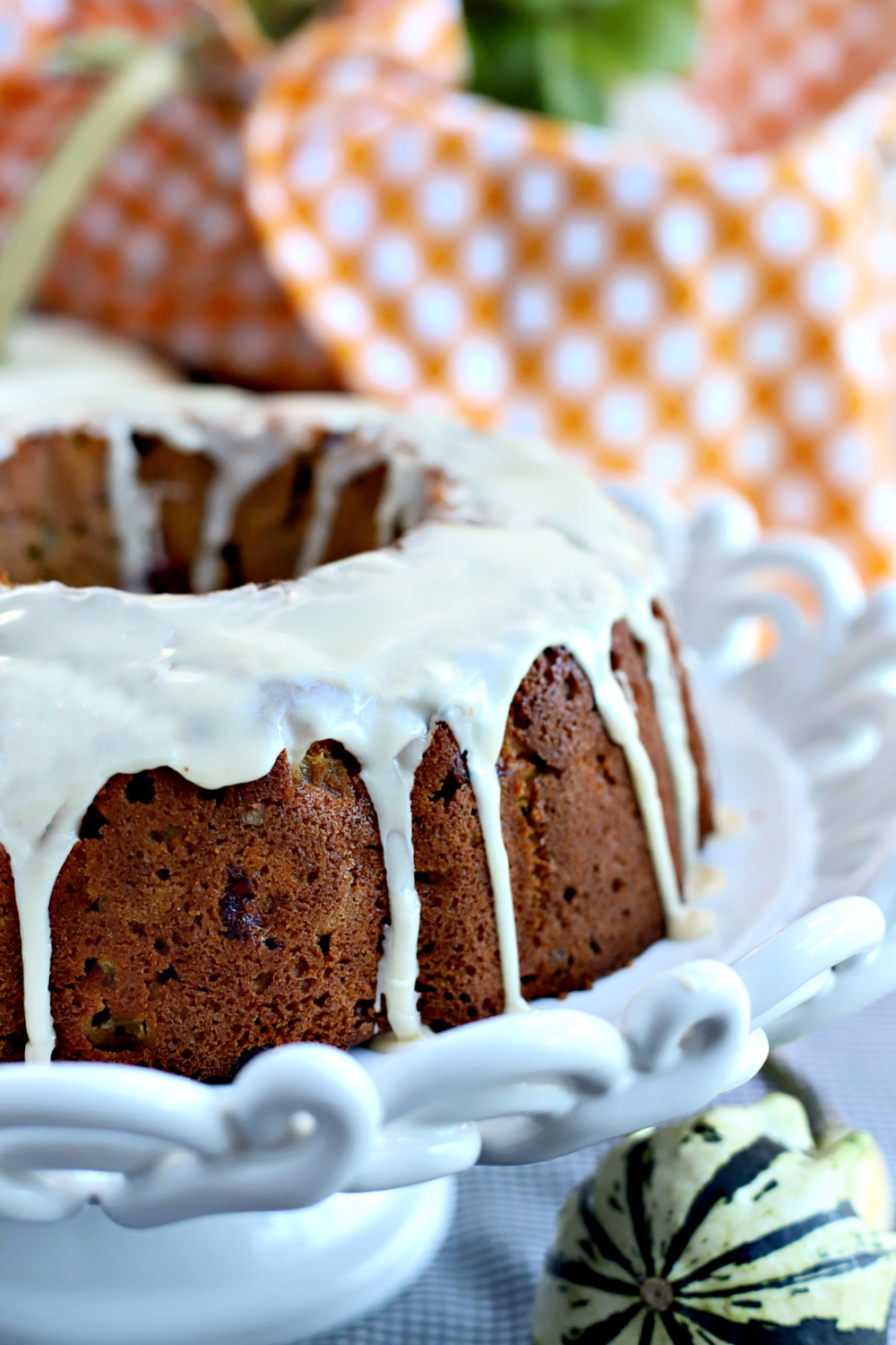 Maple syrup glazed Thanksgiving Bundt cake with all the seasons favorite flavors.