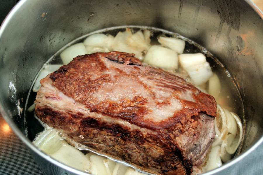 Easy, step-by-step recipe for old fashioned beef rump roast. Simmered slowly on the stovetop with carrots and potatoes until tender, it is a perfect family Sunday dinner.