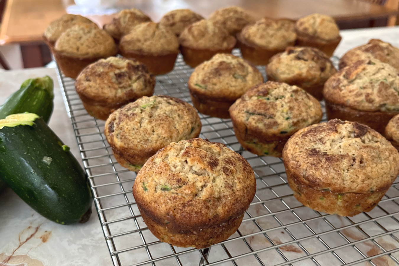 A perfect grab-and-go breakfast or snack, moist, tender muffins filled with apple, raisins, and cinnamon. Easy recipe to make ahead & freeze.