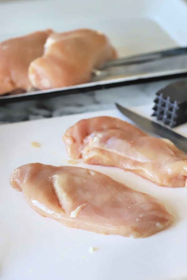 Pounding the chicken breasts for chicken francese