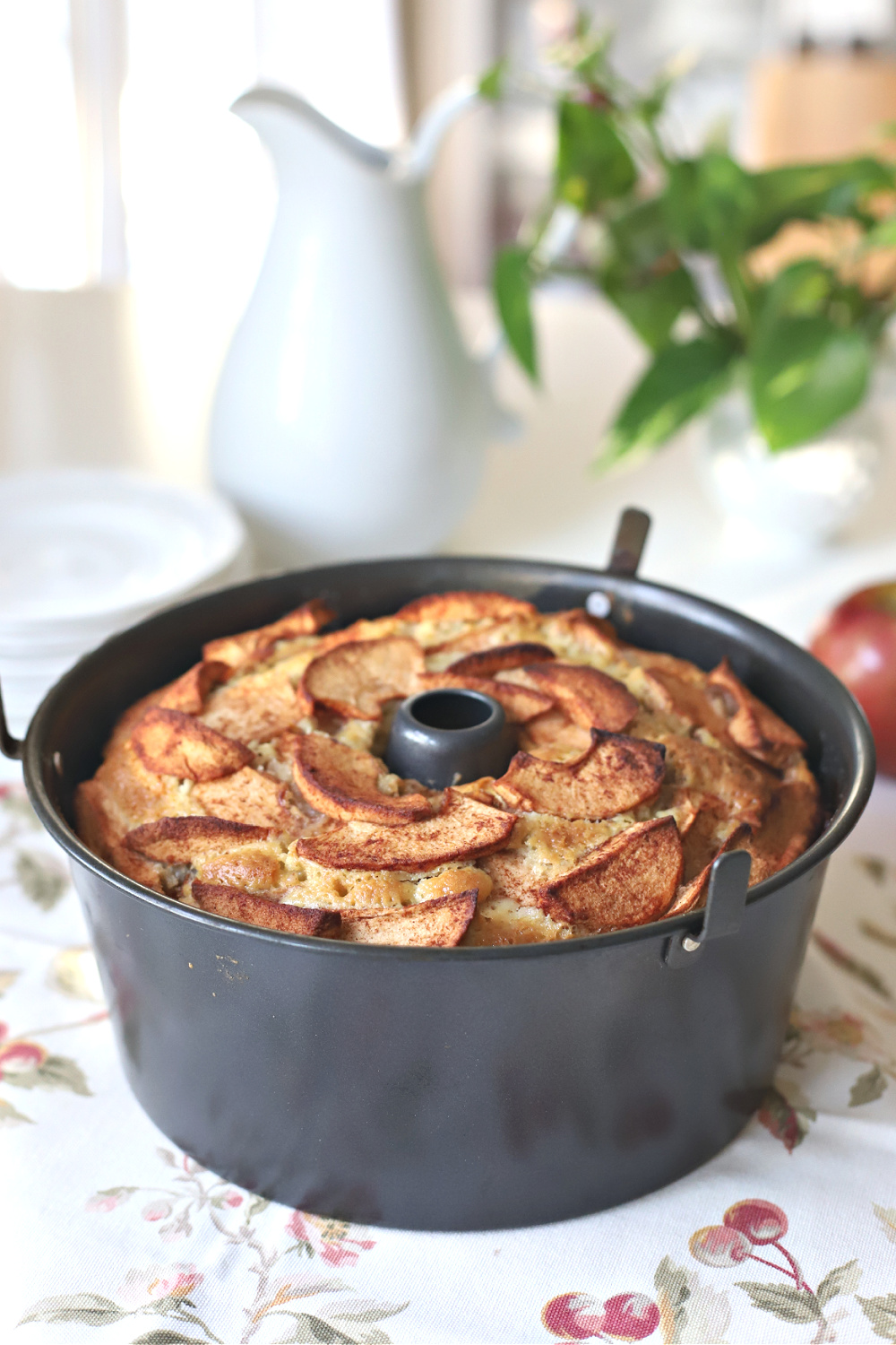 Delicious Jewish apple cake from my mom's vintage recipe is a dense, moist cake with apples in the center and on top. 