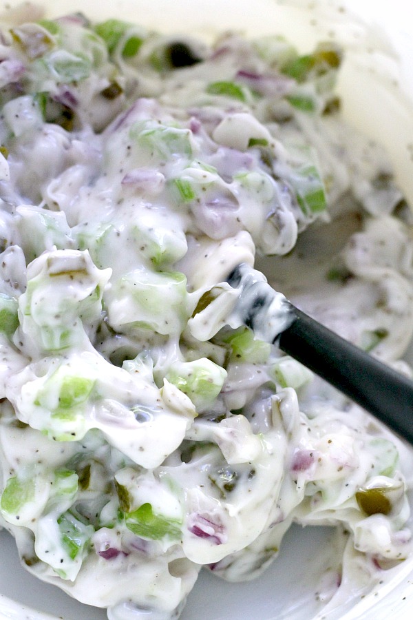 Vintage recipe for old-fashioned creamy potato salad is far from boring. Tons of flavor from sweet gherkin pickles, celery, onions & eggs. A classic barbecue favorite!