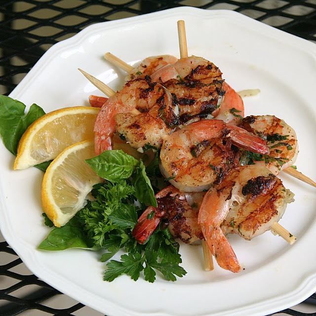 Great recipe for Grilled Herb Shrimp that are super easy to make. Marinated in a simple herb mixture then grilled to perfection in just a few minutes using an outdoor grill or indoors on a George Foreman Grill.