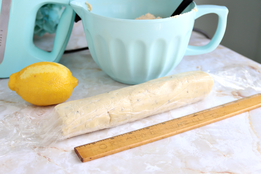 Rolling the lavender shortbread dough into a log to refrigerate for French Sables cookies.