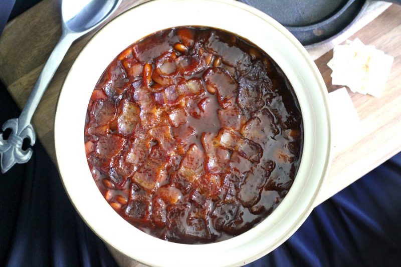 Homemade baked beans take a little time but so worth it! Tender navy or Lima beans in a brown sugar and molasses sauce is a perfect side. 