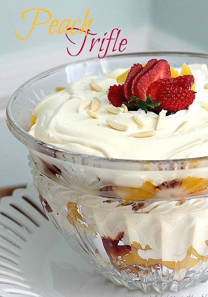Easy recipe for peach trifle made using angel food cake and raspberry preserves in a creamy pudding-like dessert.