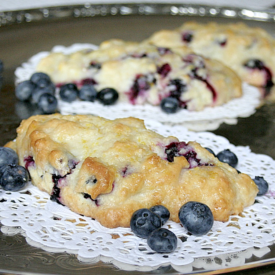 Sharing another blueberry treat ~ scones. These are wonderful blueberry scones from Tyler Florence and have a wonderful lemon glaze.