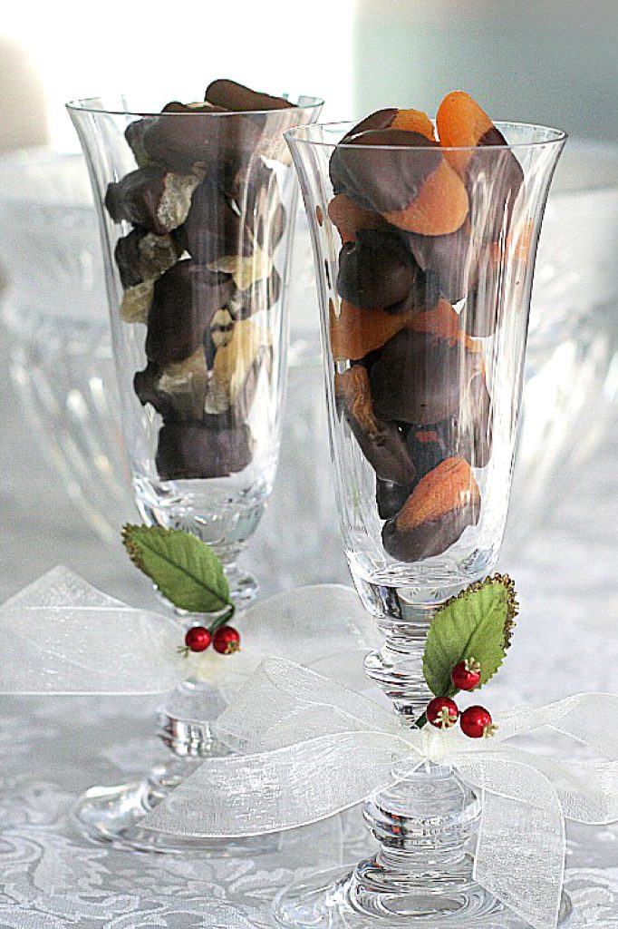 Chocolate dipped dried fruit such as apricot and pineapple chunks make a lovely food gift from your kitchen, especially packaged in a crystal stemmed glass and ties with a festive bow!
