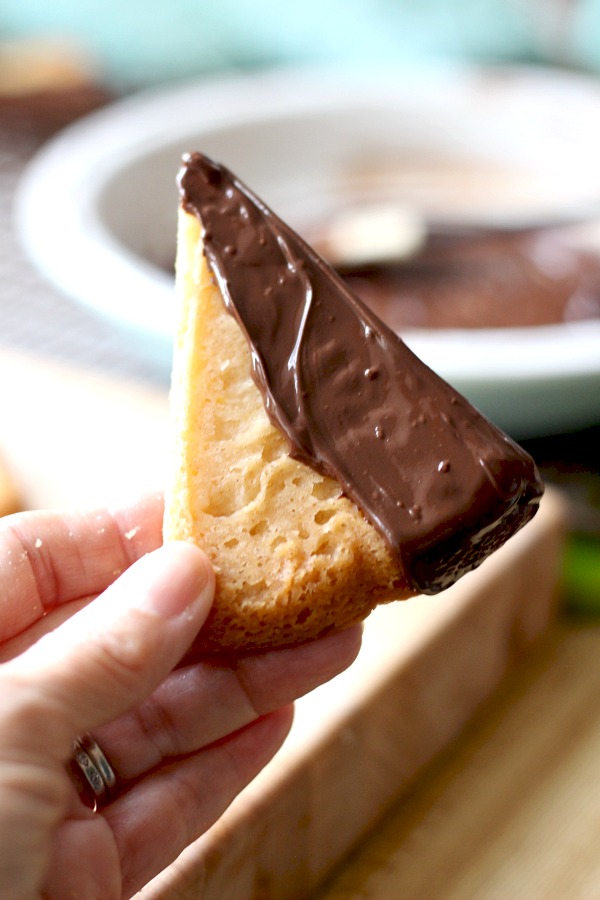 Easy recipe for chocolate dipped, orange spice shortbread. Delicious and beautiful with or without sprinkled nuts to enjoy with coffee or tea. Lovely addition to the holiday cookie tray and wonderful as homemade gift from the kitchen.
