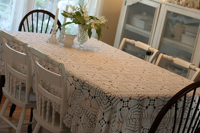 A lovely example of grandmother's workmanship and handiwork is her vintage tablecloth. Crocheted in the pineapple pattern and made in the 1940's using tiny crochet hooks.