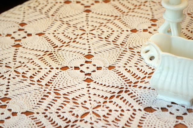 A lovely example of grandmother's workmanship and handiwork is her vintage tablecloth. Crocheted in the pineapple pattern and made in the 1940's using tiny crochet hooks.