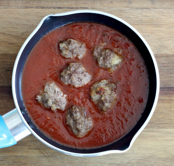 Super easy meatball recipe. Browned in a skillet or baked on the oven, they are soft, tender and delicious served with pasta or as a meatball sandwich.