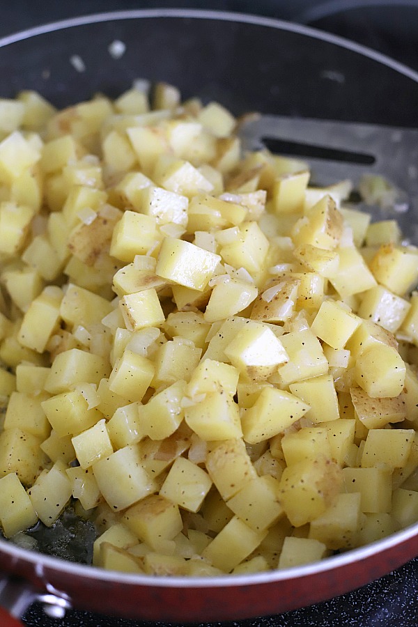 Easy recipe for homemade hashed browns. Diced potatoes are cooked in butter to perfection with a crispy exterior and great potato flavor. Great with eggs and bacon for breakfast or as a dinner side dish.