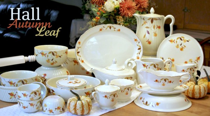 A collection of vintage Hall Autumn Leaf pottery pattern pieces with Jewel tea pot, mixing bowls, pitcher, coffee pot, platter and pie dish.