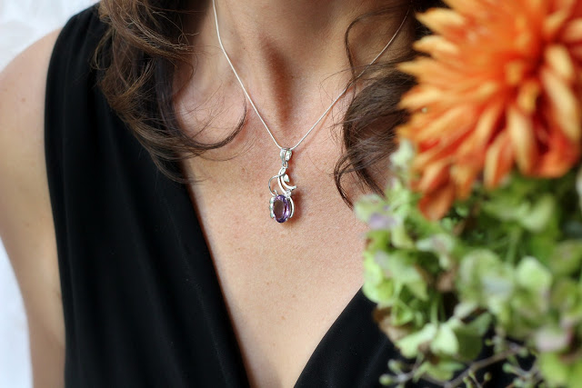 Novica jewelry and necklace from India is a beautiful amethyst flower necklace called, Nostalgia.