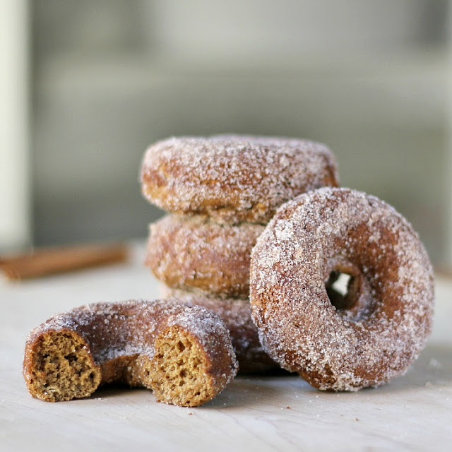 Baked Cider Doughnuts are delicious and a great alternative to fried versions without giving up flavor. Made with apple butter, cinnamon and maple syrup then rolled in more cinnamon sugar, they are a fall food favorite.