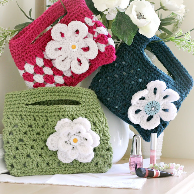 Easy pattern for adorable crochet boutique bags. Great size as a clutch to hold cell phone & wallet or as a cosmetic bag. Cute for little girls too.