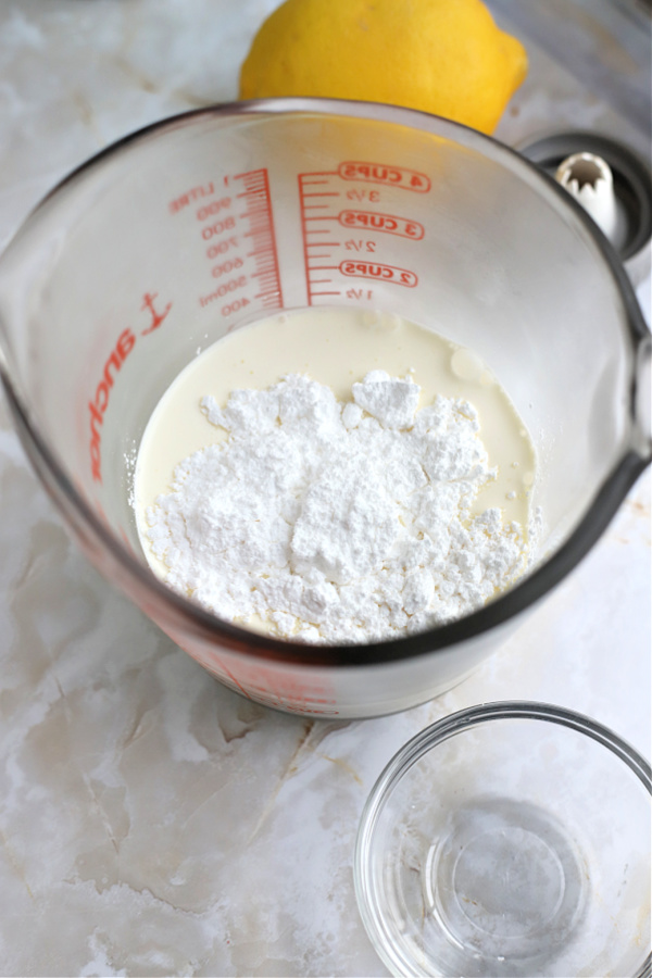 Easy how-to for making homemade whipped cream for triple lemon cheesecake.