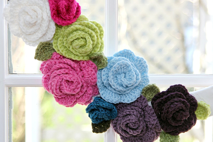 Beautiful, colorful rosettes for crafts and decorating projects. Easy step-by-step how-to pattern for making crochet leaves and roses.