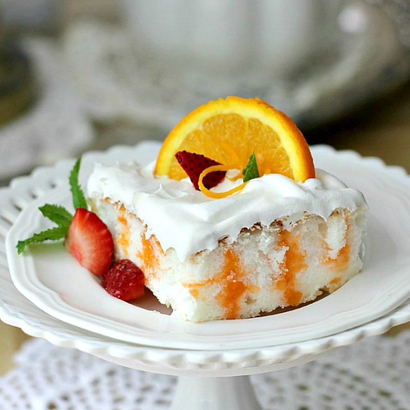 Easy recipe for Orange Angel Cake begins with a box mix. Poke holes throughout the baked cake and pour gelatin mixture over; cool and spread with whipped topping. Delicious!