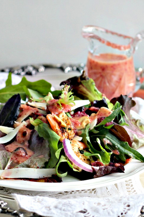 A great salad needs a delicious dressing. One that won't overpower the greens yet give it lots of flavor. Cranberry orange salad dressing adds a bright citrus taste with little flecks of cranberry throughout a creamy vinaigrette.