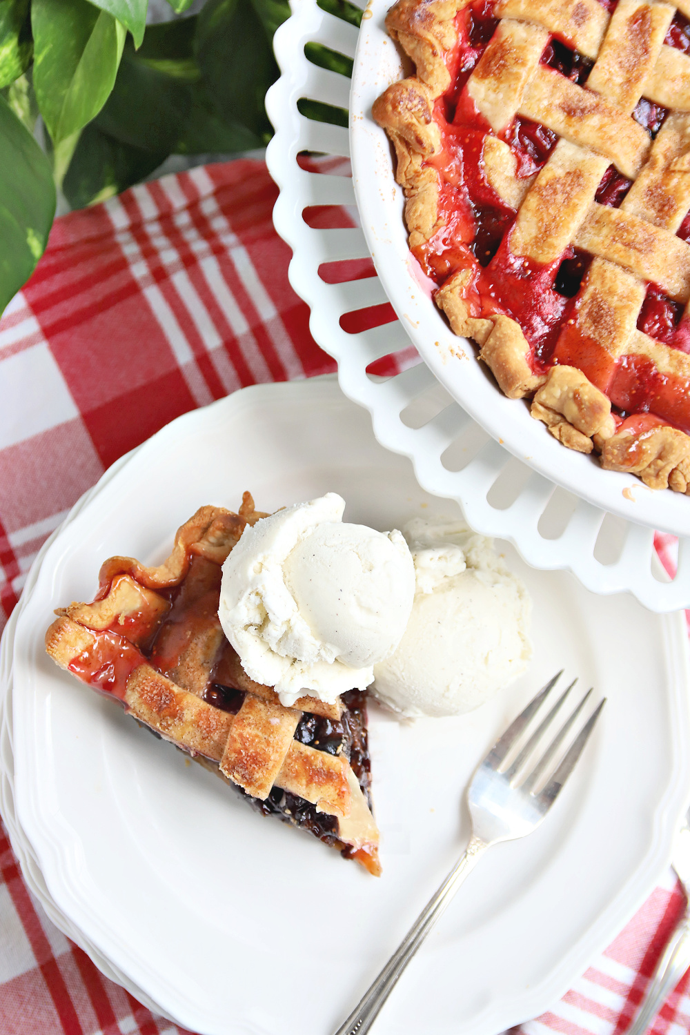 A slice of cranberry and fig pie with the perfect balance of sweet and tart flavors. Easy recipe for this old-fashioned dessert with how-to instructions for making the pretty lattice top crust.