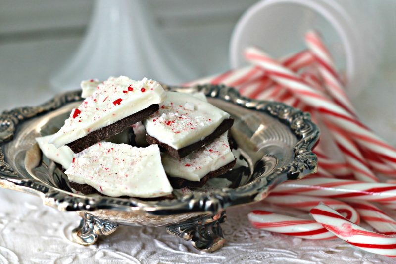 Chocolate Peppermint Bark, an easy recipe of layered white & milk chocolate flavored with peppermint and topped with crushed candy canes.