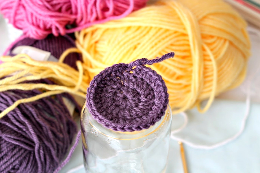 Don't toss those jars and cans! Reuse, recycle and repurpose into useful items. Easy how-to pattern to crochet a sweet cozy to make a flower vase or container for multipurposes.