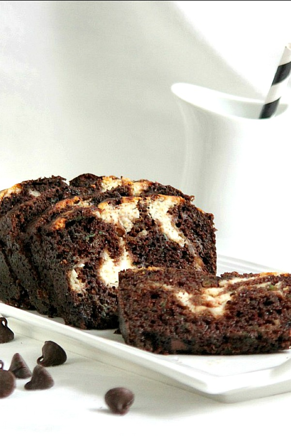 Cream Cheese Swirled Double Chocolate Zucchini Bread - that is a lot of words for a recipe title!  But it fits for this concoction I came up with for a rich and chocolaty bread that has three cups of zucchini!