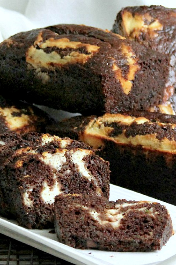 Cream Cheese Swirled Double Chocolate Zucchini Bread is a rich and chocolatey bread that is moist and delicious with cream cheese swirled throughout.