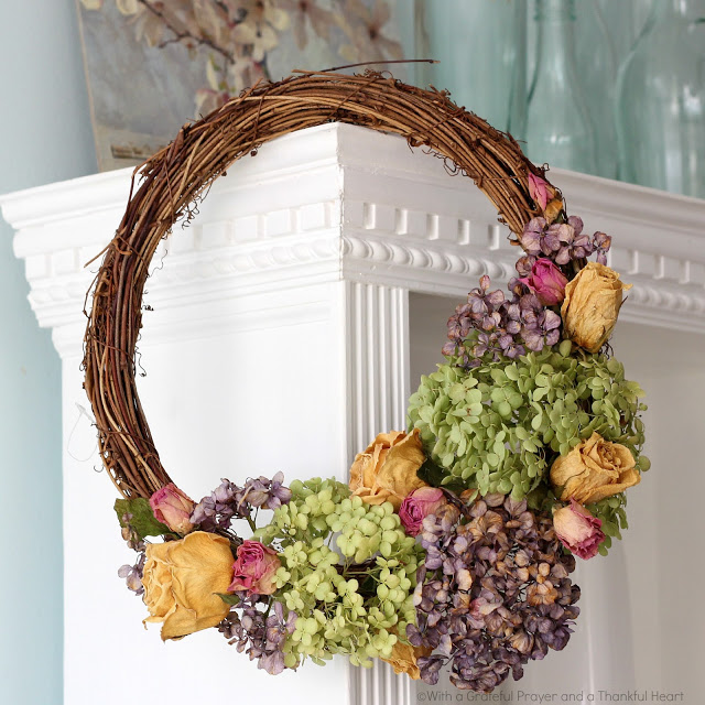 Preserve hydrangea, roses and garden flowers by drying then used to create a lovely wreath.