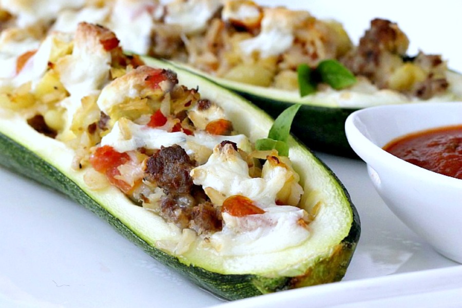 One of the bests things about summer are the fabulous vegetables for the garden, road-side stand or grocery store. Try these garden fresh zucchini boats stuffed with sausage, rice, tomatoes, Parmesan and mozzarella cheese for a tasty summer vegetable entree.