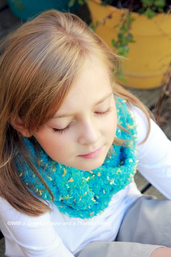 Easy pattern for crochet infinity braided scarf. Three strips worked in basic crochet stitches, braided and stitched together. Very adaptable pattern.