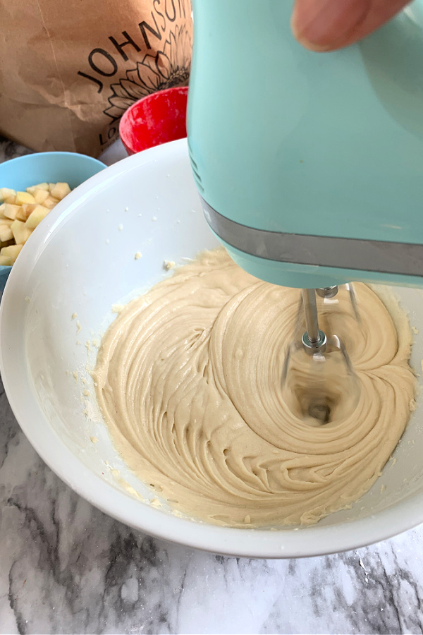mixing the batter for apple coffee cake
