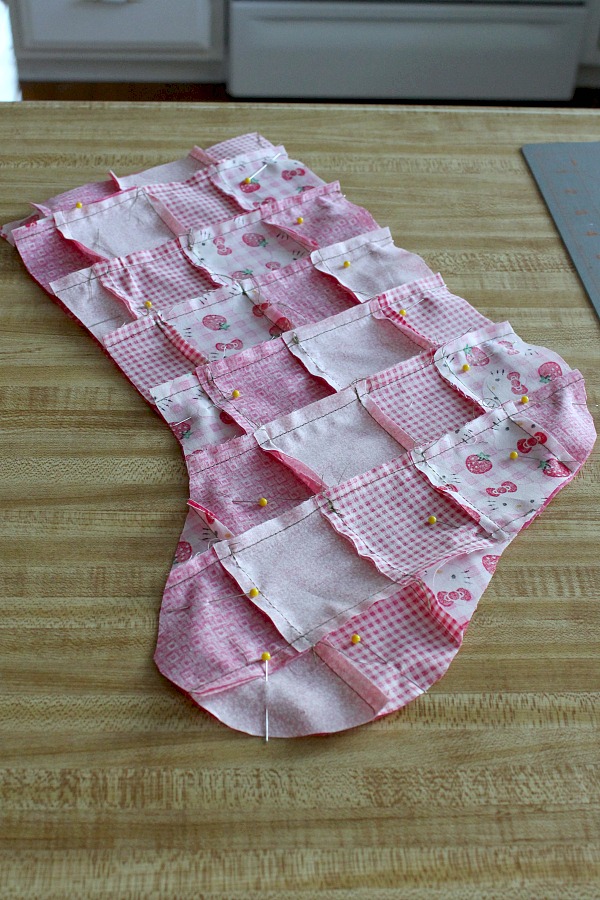 How to pattern for sewing a Patchwork Christmas Stocking easy enough for a beginner. Makes a sweet, personalized gift for kids and grandchildren.