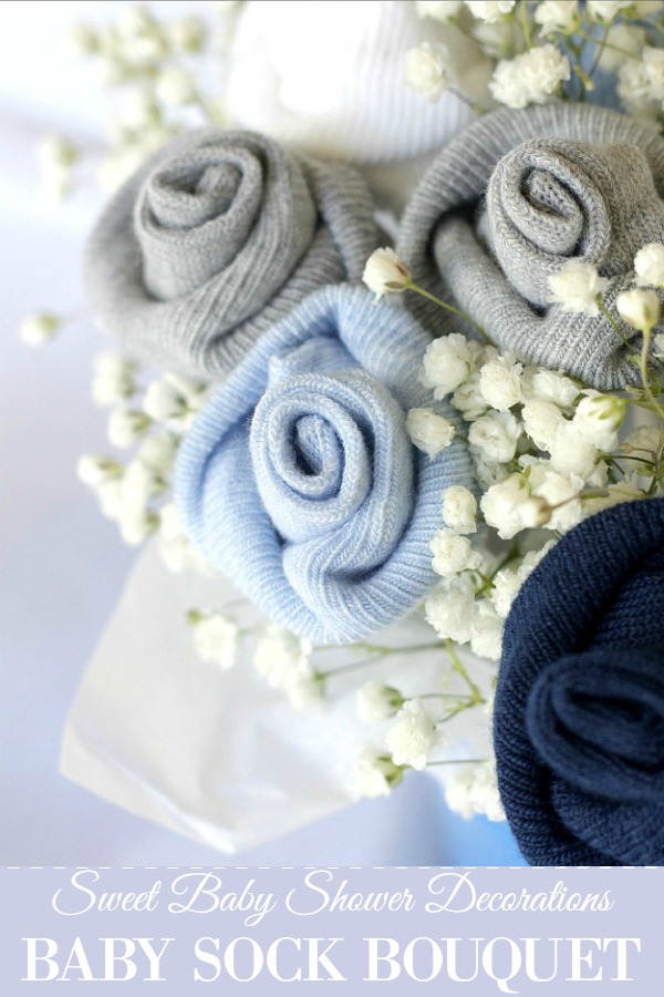A perfect gift or centerpiece for a baby shower or new mom gift. Easy to follow tutorial to make a sweet Baby Socks Rose Bud Flower Bouquet.