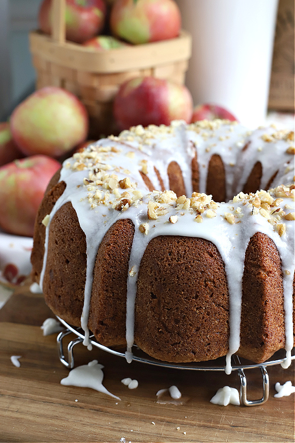 Need a quick and easy dessert? You'll love frosted apple walnut Bundt cake with grated apples, cinnamon, nutmeg, cloves, and walnuts or pecans.