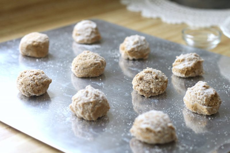 Lightly spiced Ginger Crinkles are a favorite when baking cookies with kids. Crunchy and crackled outside with chewy center. Perfect for autumn.