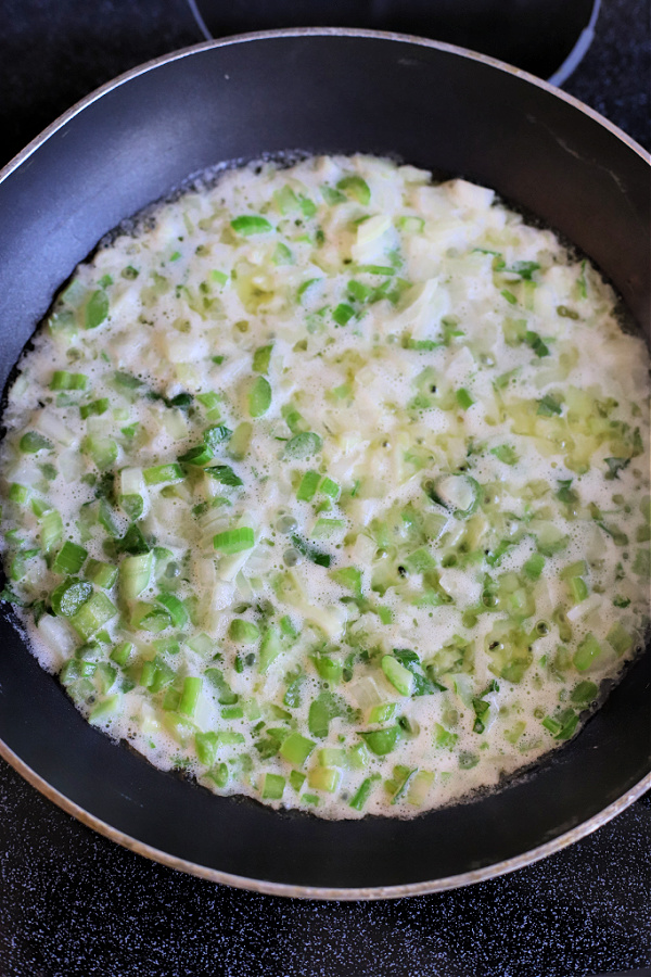 simmering celery and onions in butter for Thanksgiving stuffing