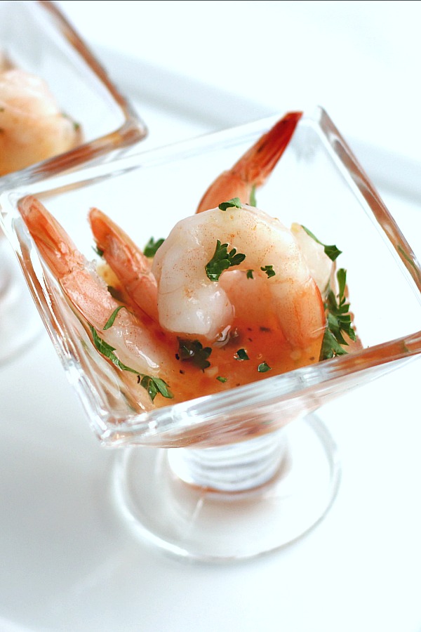 Hosting a New Year's Eve or holiday cocktail party?  Serve Sweet Chili Thai Sauce with Shrimp Appetizer. It is festive and delicious. Quick and easy recipe!