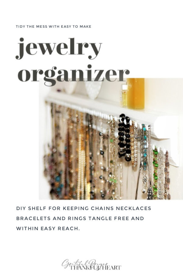 Perfect solution for tangled necklaces and bracelets. Easy DIY wooden wall shelf has lots of hooks to keep jewelry neat and within easy reach. 