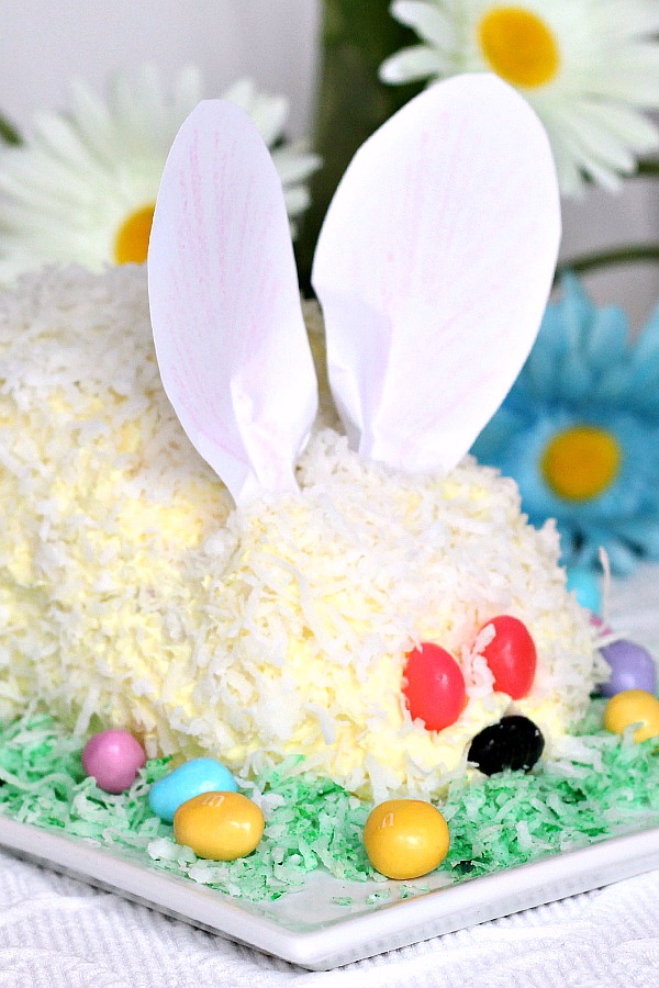 Make an easy Easter bunny cake using a box cake and either homemade or from-a-tub frosting for a sweet holiday dessert. A great cooking with kids activity as they assemble, frost and sprinkle on coconut.