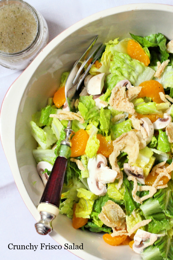 1980's retro recipe, Crunchy Frisco Salad is an easy recipe using just 5-ingredients. Mandarin oranges, mushrooms greens, fried onions and Italian dressing.