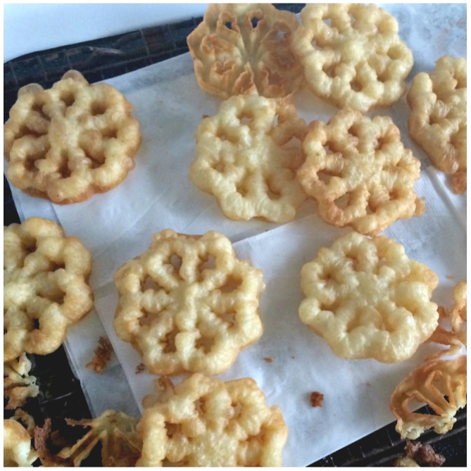 How-to recipe for Scandinavian Rosettes. These thin, cookie-like pastry treats are deep-fried until light and crispy. An easy recipe perfect on your holiday cookie tray or any time.