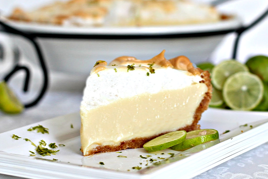 Easy recipe for key lime pie that's sure to tantalize your taste buds with its creamy sweet and tart goodness. Top with meringue or fresh whipped cream.