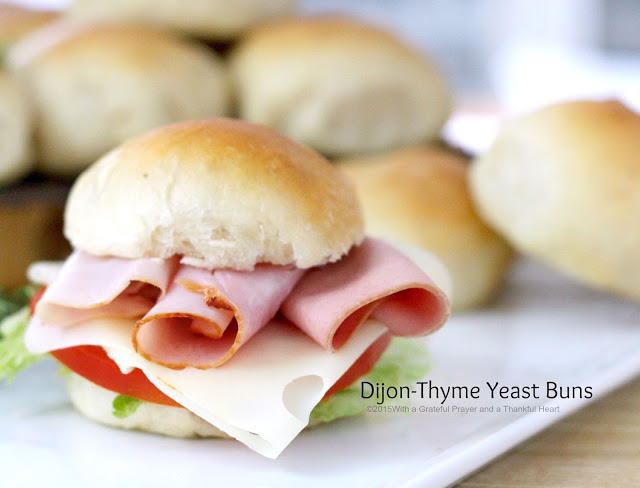 Easy recipe for Dijon Thyme Yeast Buns that are soft and fluffy and make the best deli sandwiches. Dough made in a bread maker.