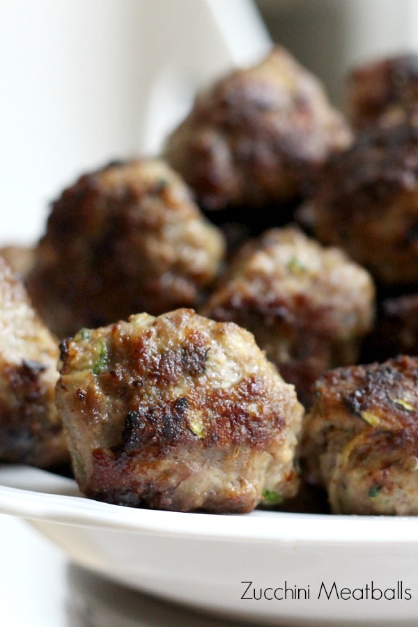 Add more veggies to your family meals. Try this delicious recipe for zucchini meatballs with shredded zucchini. So much flavor in these pan-fried meatballs.