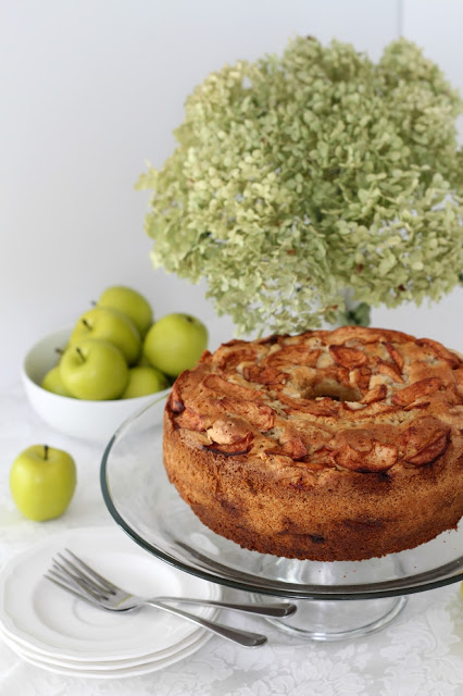 Incredibly delicious and moist Jewish Apple Cake from Mom's vintage recipe. Baked in a bundt pan and filled with the wonderful autumn flavors of apple and cinnamon.