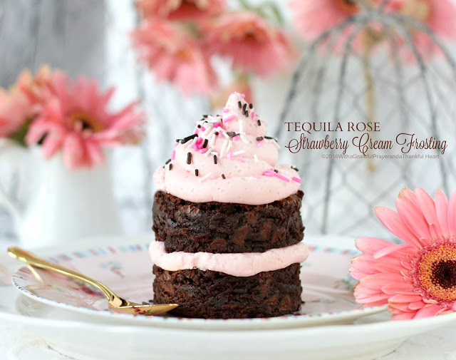 Tequila Rose Strawberry Cream Frosting is a pretty-in-pink Valentine's Day dessert and a snap to make.  Bake up a batch of brownies or cupcakes, pipe on the frosting; sprinkle with jimmies then share with the love of your life!